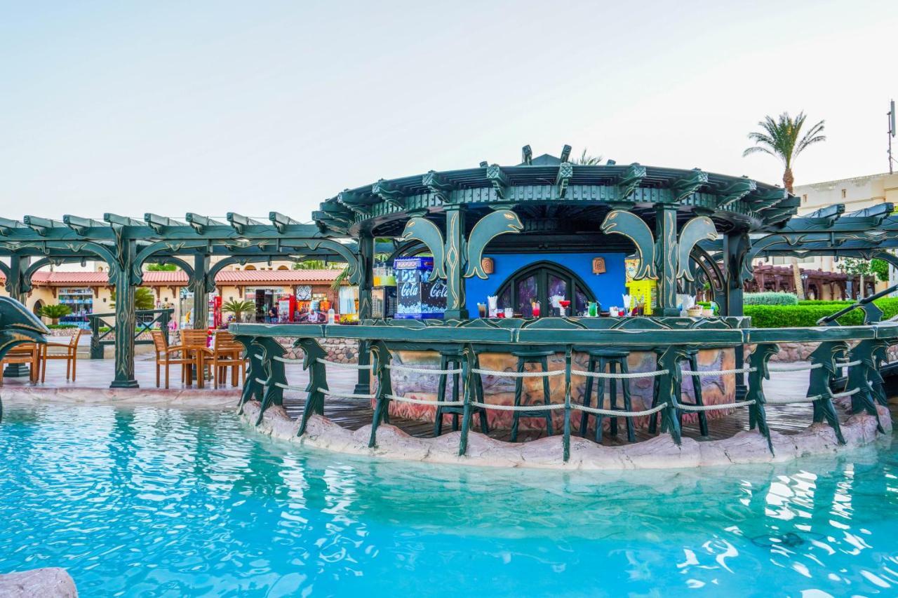 Charmillion Club Resort Charm el-Cheikh Extérieur photo The swimming pool at the hotel