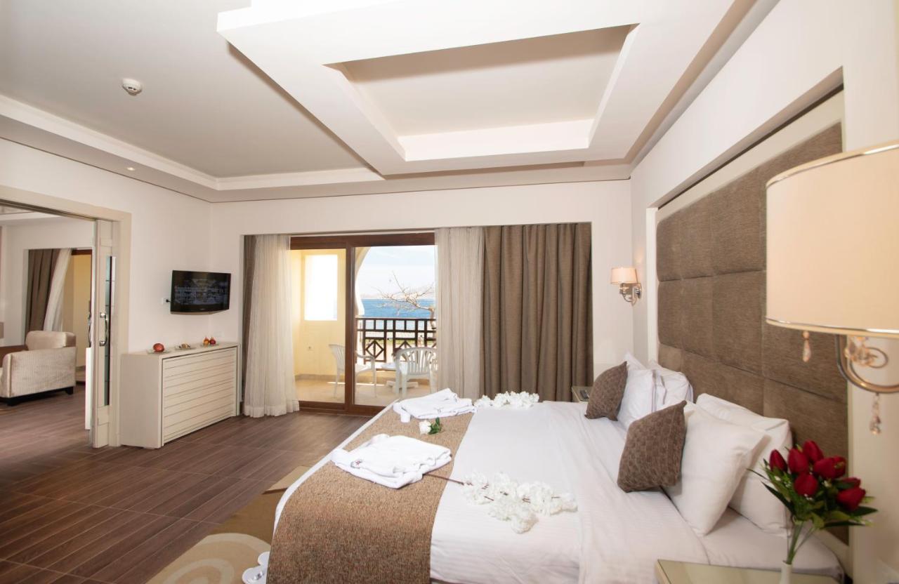 Charmillion Club Resort Charm el-Cheikh Extérieur photo A bedroom at the hotel
