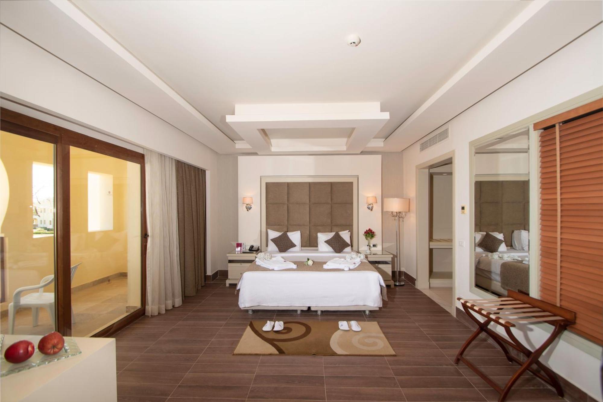 Charmillion Club Resort Charm el-Cheikh Chambre photo A bedroom at the Taj Bengal